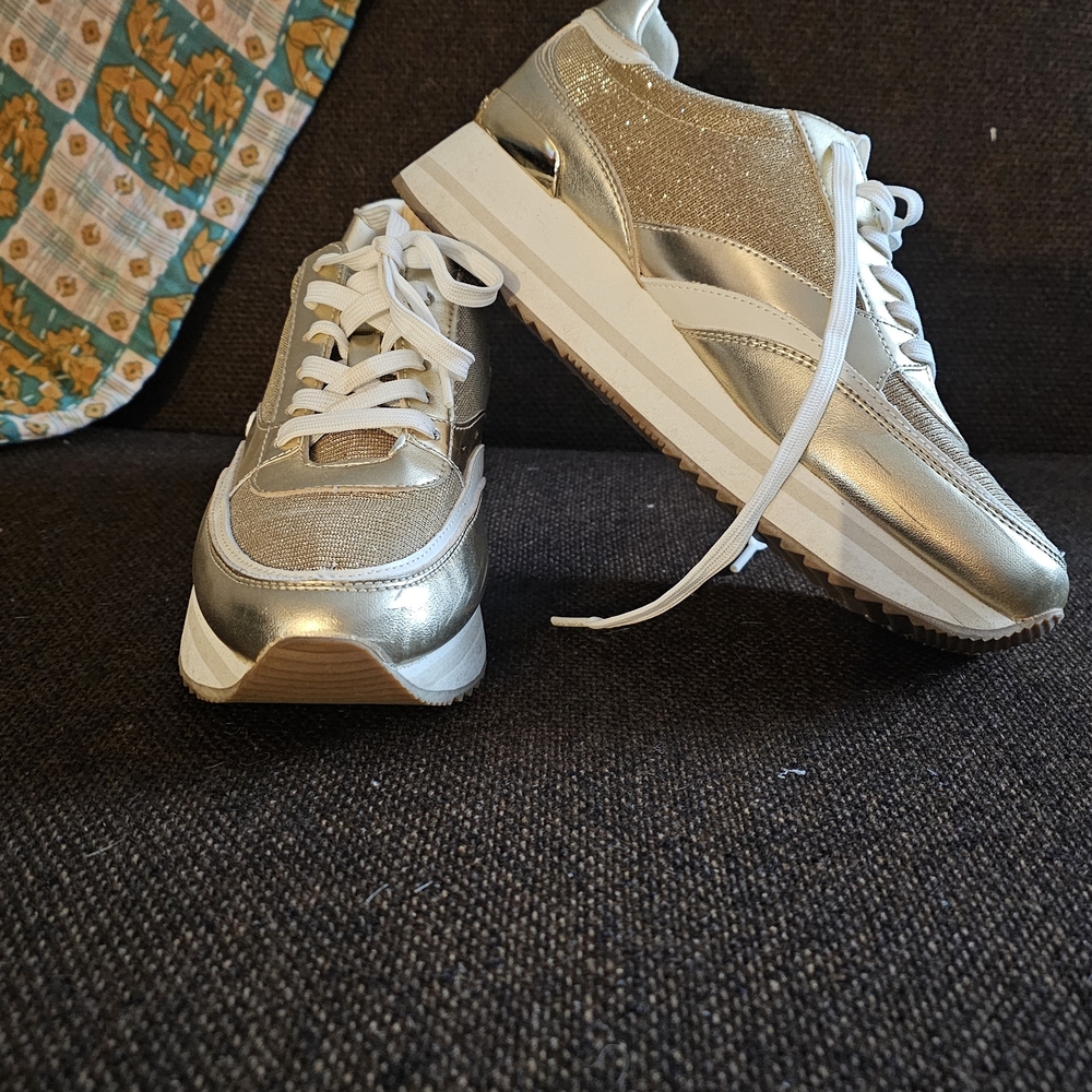 Stylish Michael Kors Gold Sneakers with White Accents